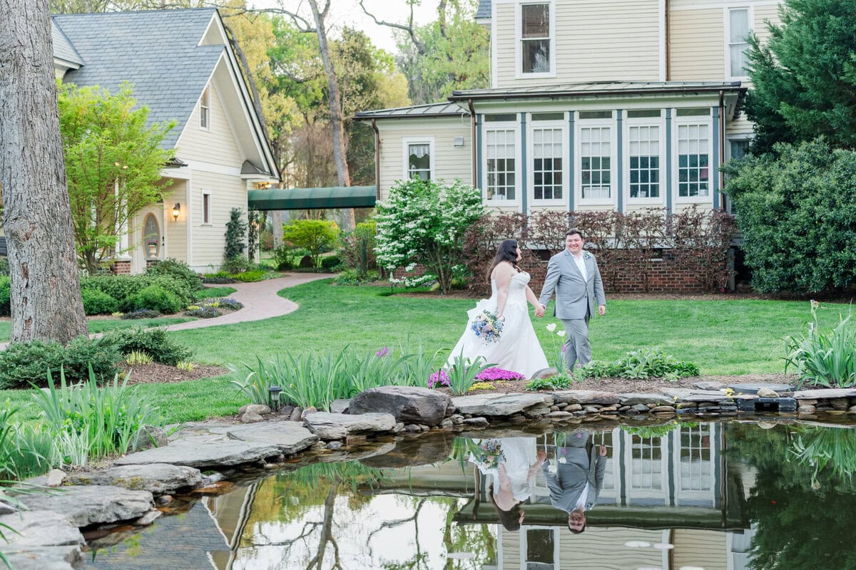 Bride and groom under century old oak trees at Alexander Homestead in spring