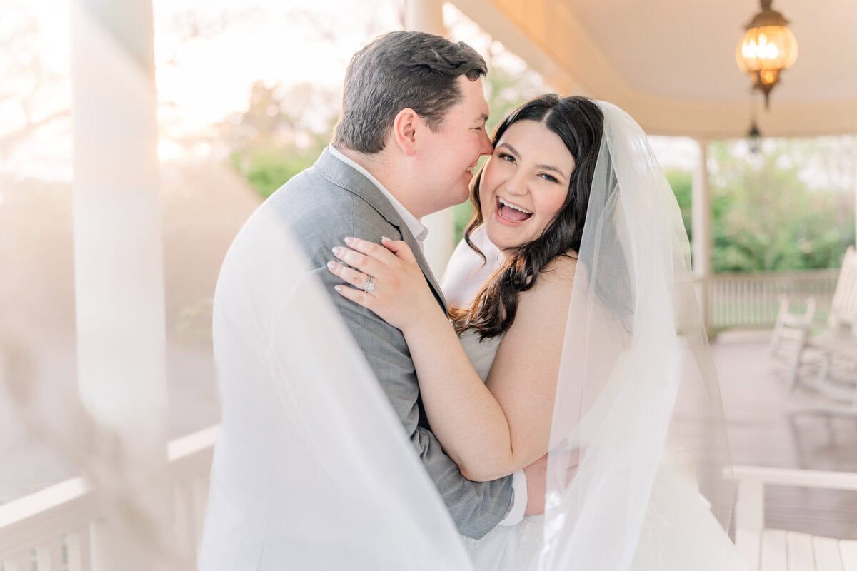 Bride with cathedral veil and ball gown at Alexander Homestead manor
