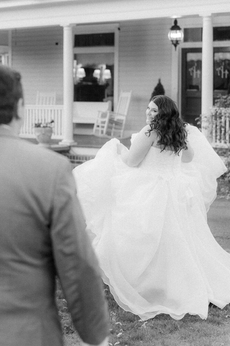 Runaway bride shot with groom chasing bride in ball gown at Alexander Homestead