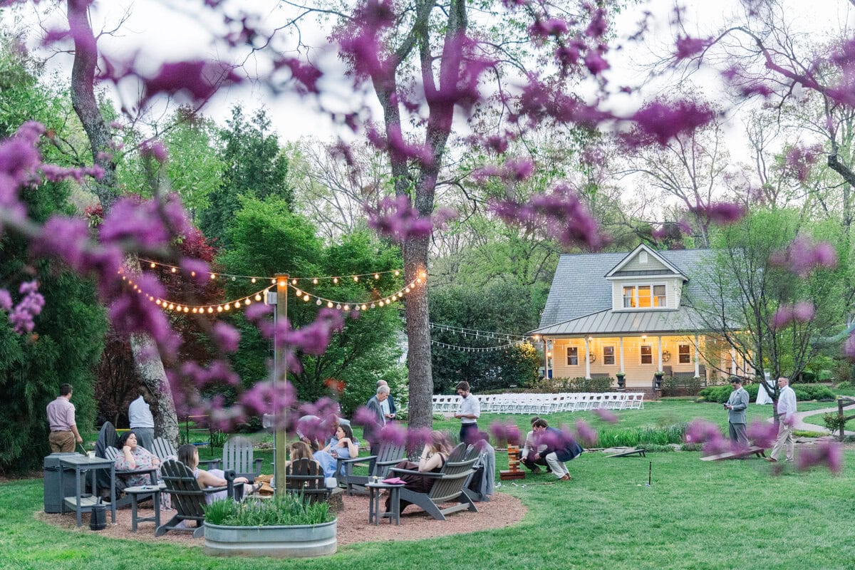 Outdoor spring wedding at Alexander Homestead botanical garden during blue hour