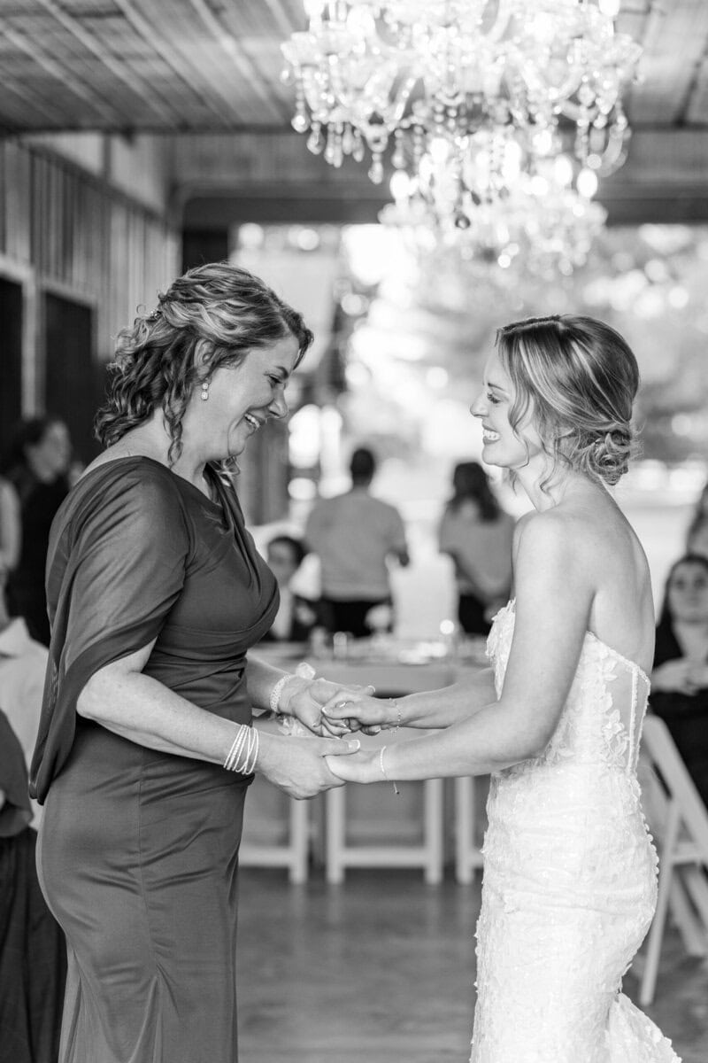 One of the best wedding photographers in Charlotte, NC captures a special mother daughter dance at a wedding