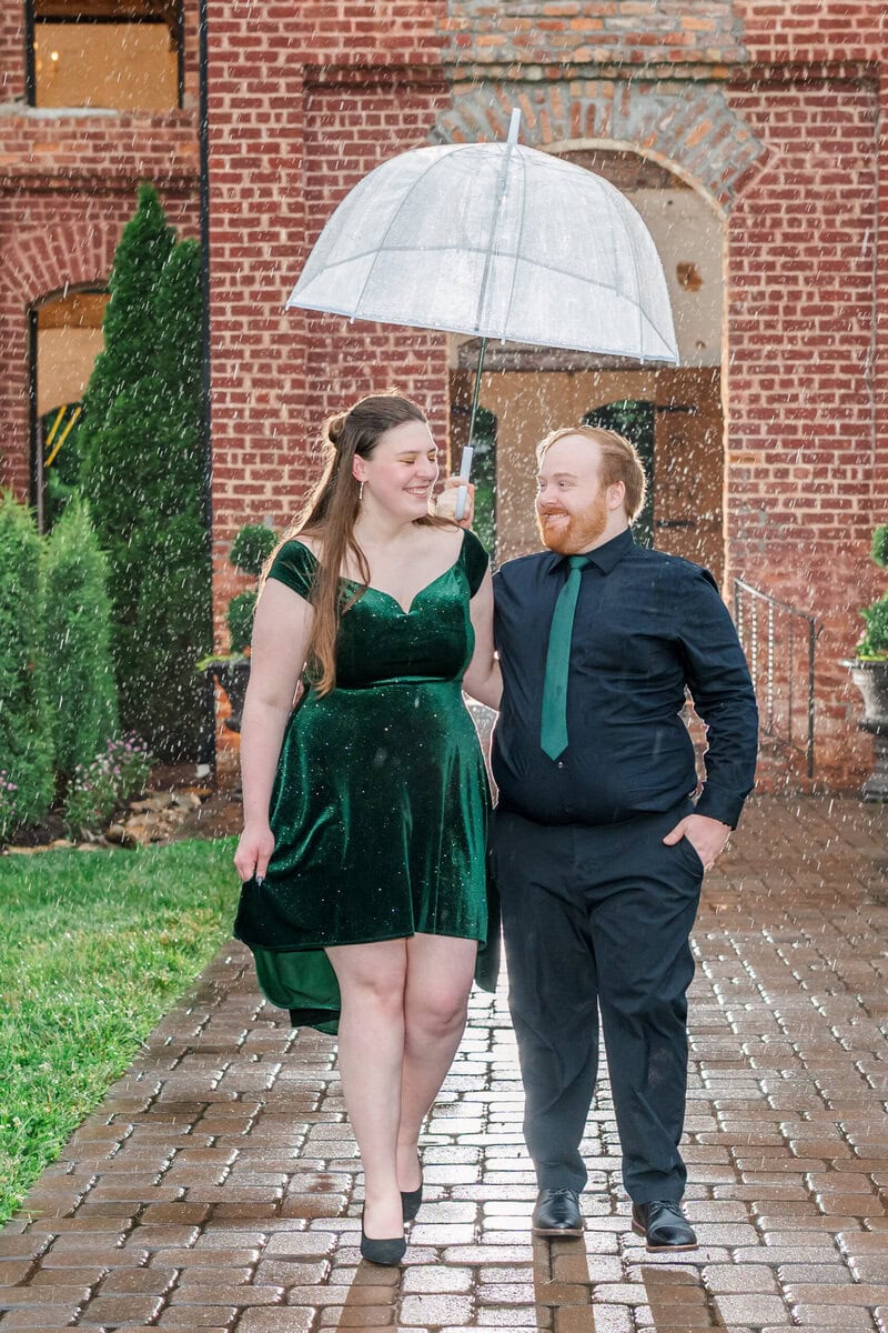 Off-camera flash rain photo at The Providence Cotton Mill engagement session in North Carolina