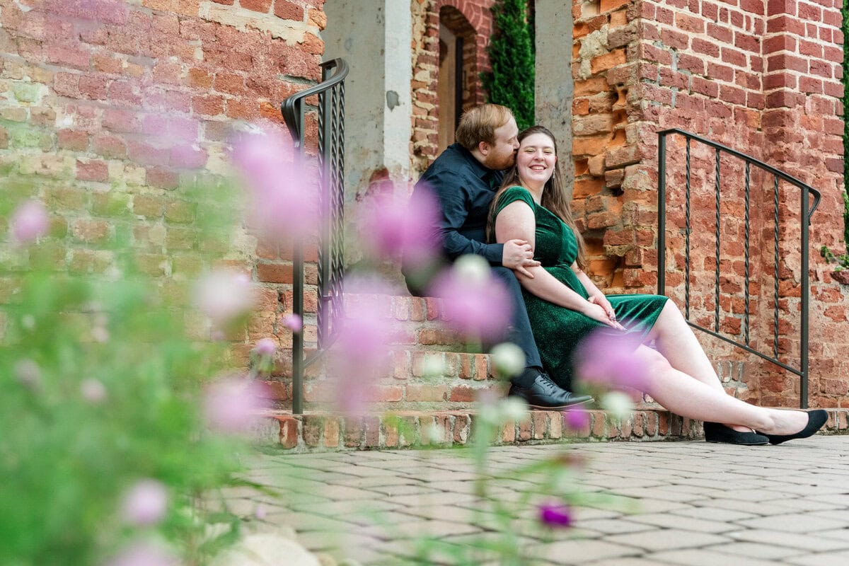Outdoor engagement portraits on the grounds of The Providence Cotton Mill in Maiden NC
