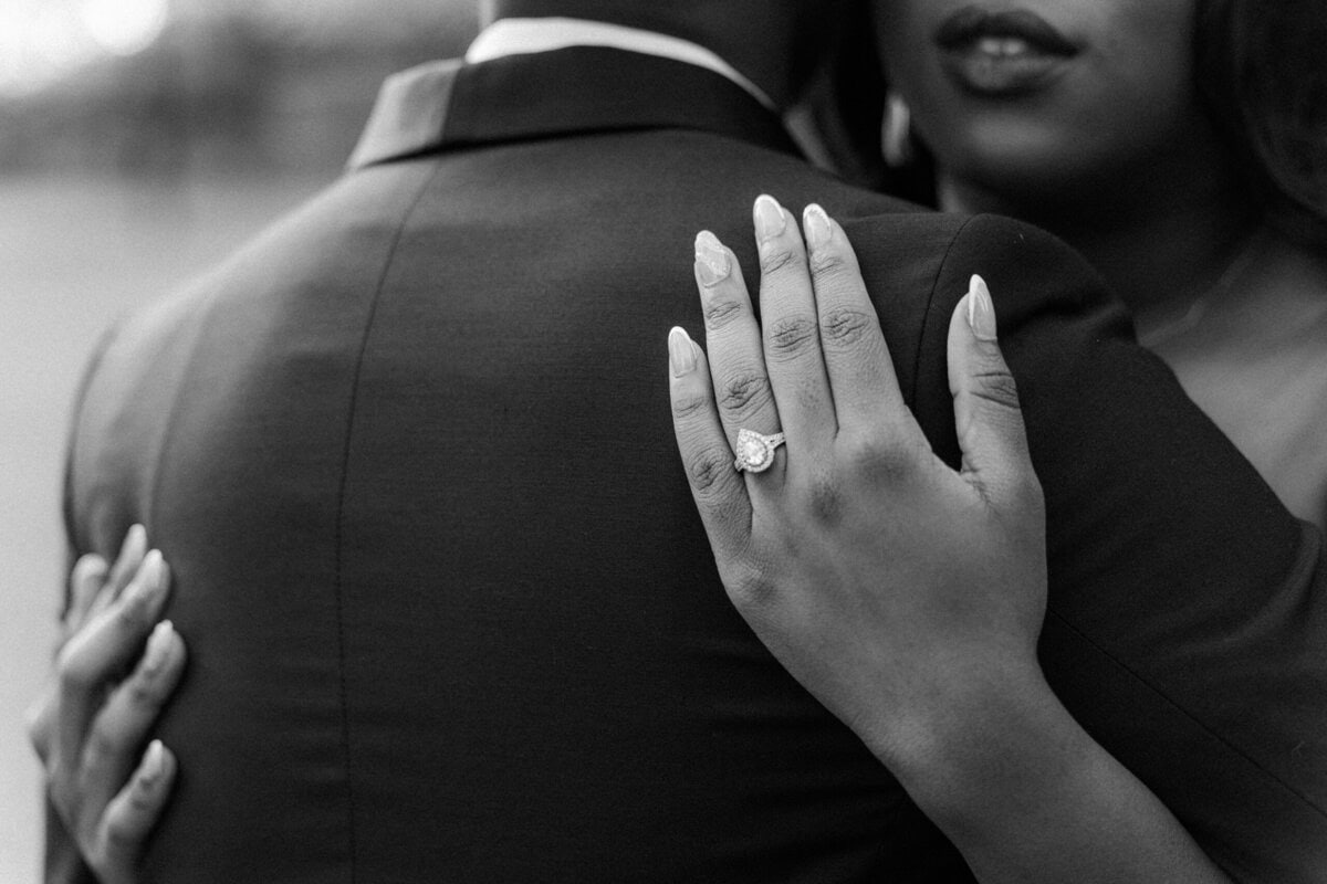 Close up of engagement ring during Uptown Charlotte engagement photos