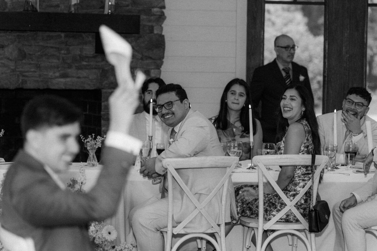 Wedding guests watching the shoe game at a Rolling Hill Venue reception