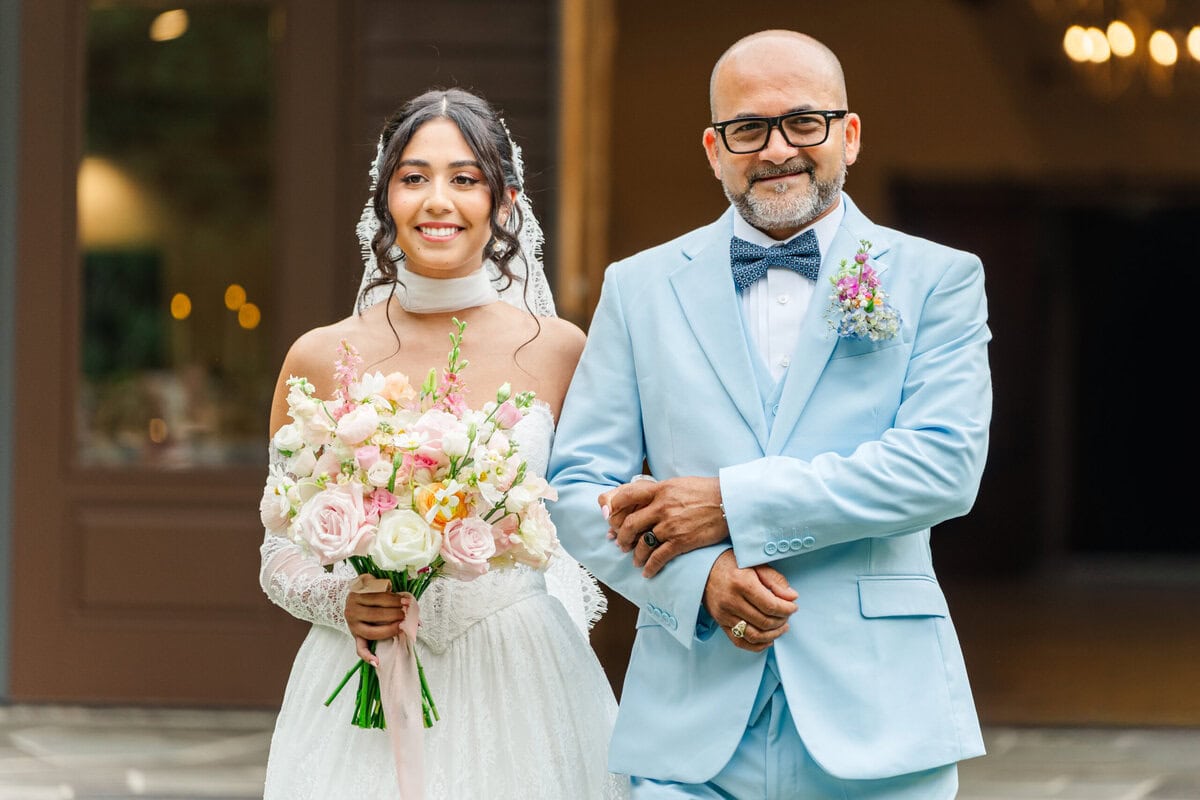 Bride walking down the aisle with her father at a Monroe NC wedding