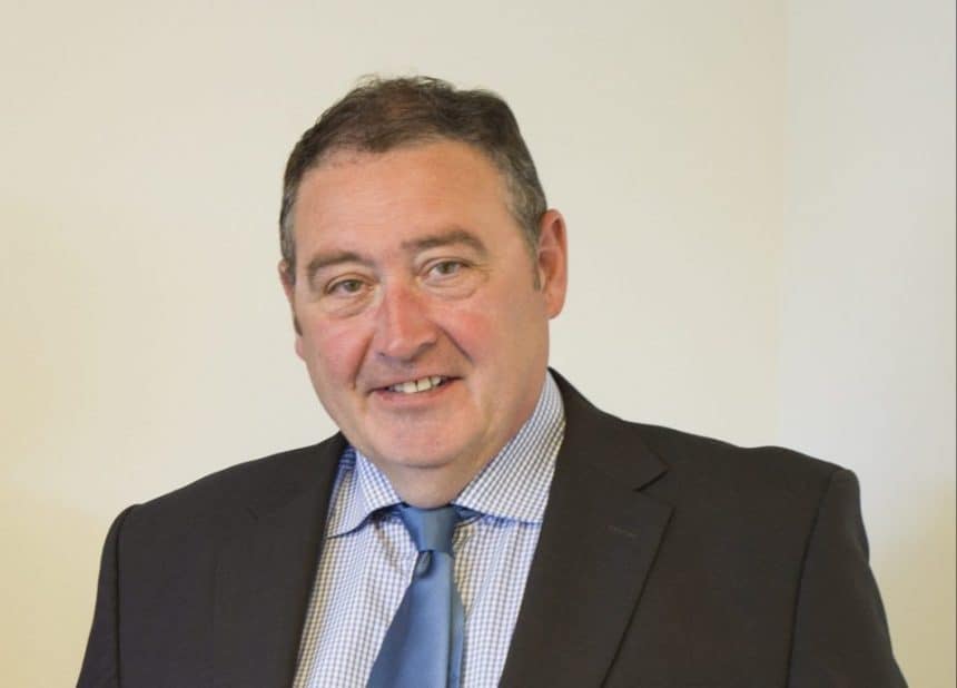 Businessman in suit and tie, professional portrait, commercial fishing industry context, industry or.