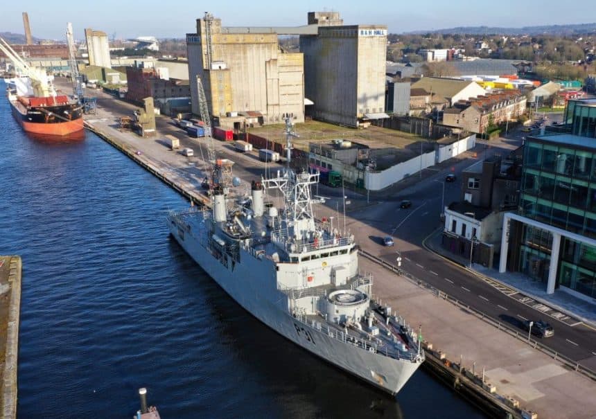 Commercial fishing vessel docked at port in Cork, Ireland, industry equipment visible.