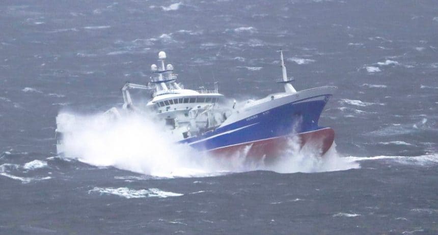Fishing vessel navigating rough seas, commercial fishing industry publication.