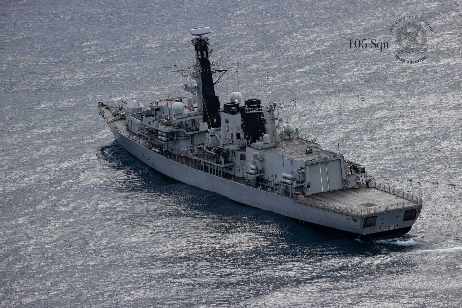Large fishing vessel at sea with industry equipment and gear visible, commercial fishing industry.