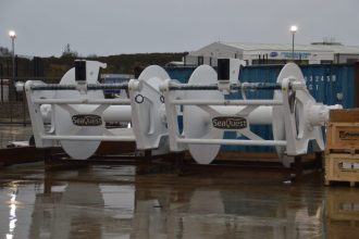 Commercial fishing vessel gear on dock, industry equipment for fishing boats, port scene.