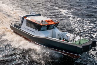 Commercial fishing vessel operating in open water, industry equipment visible, industry-focused.