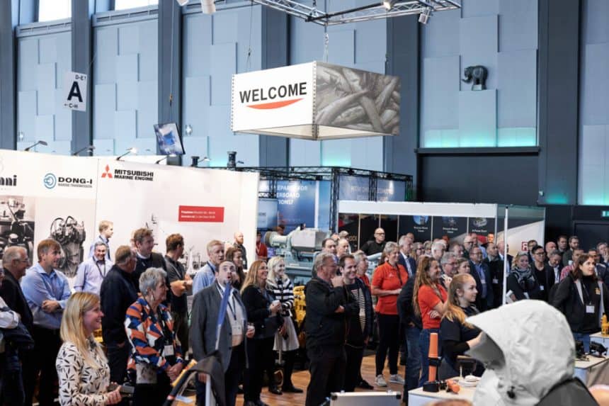 Commercial fishing industry exhibition with fishermen and industry equipment on display at DanFish.