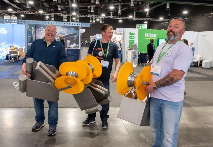 Fishermen at industry event showcasing commercial fishing gear and equipment in Aberdeen.