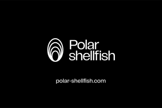 Polar shellfish logo on black background, commercial fishing industry publication.