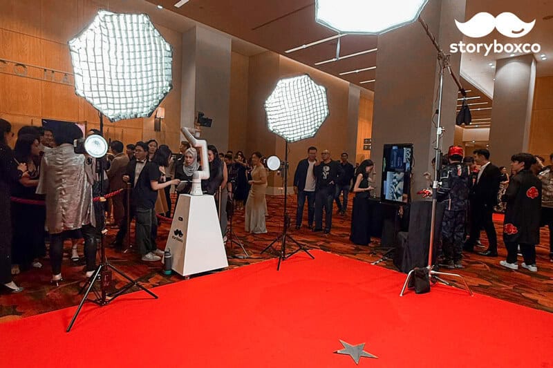 Vintage photo booth setup with lighting and camera equipment at a Singapore event.