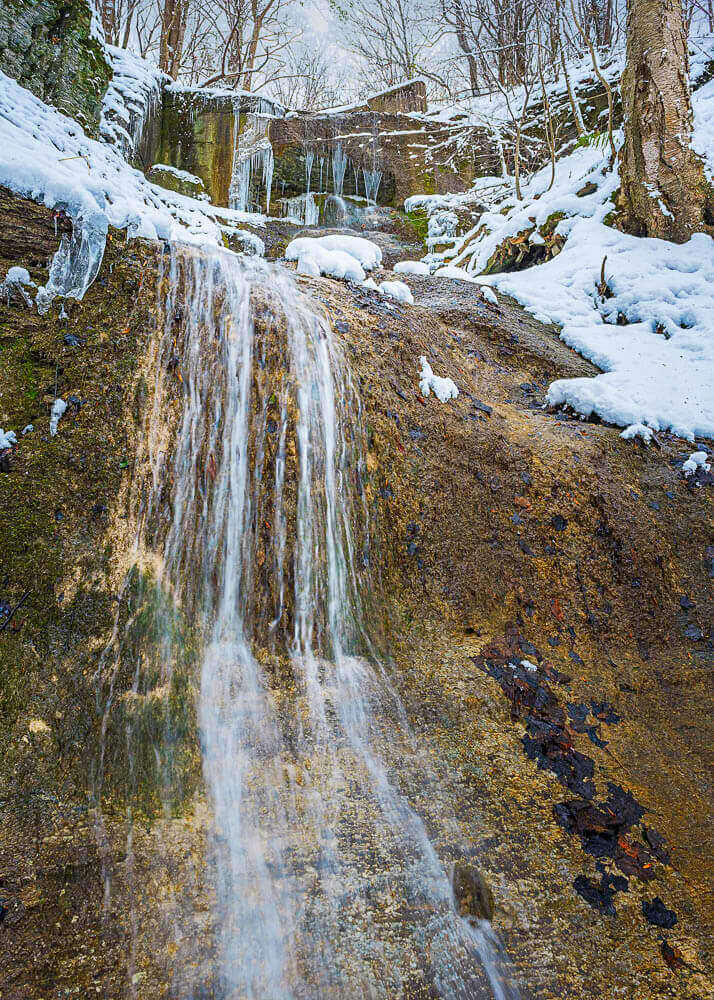 top of a long waterfall along west valley road on the south side of Otisco Lake