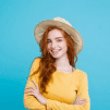 Woman smiling after professional carpet cleaning in a bright room.