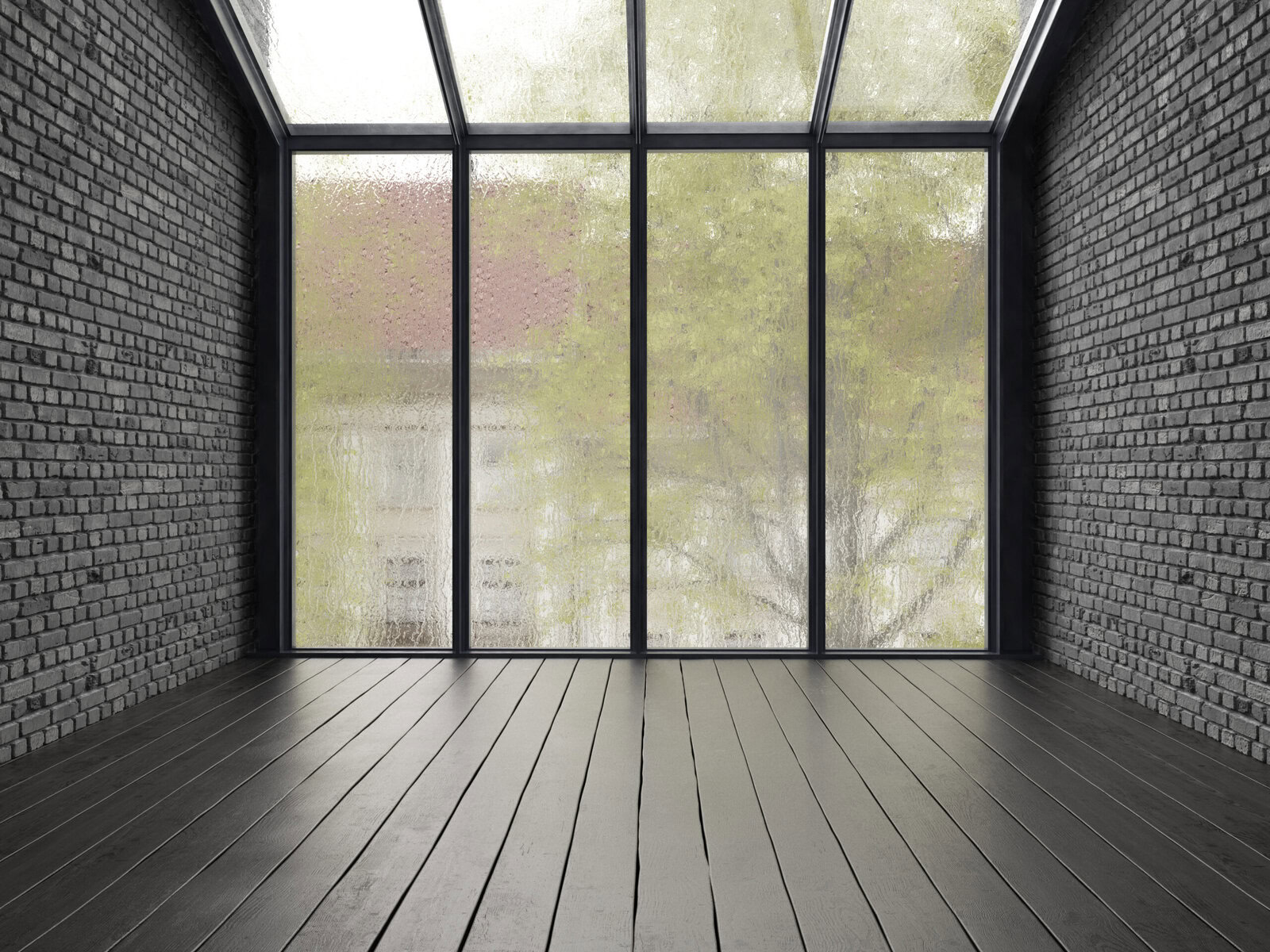 Empty room with dark brick walls, wooden floor, and large window