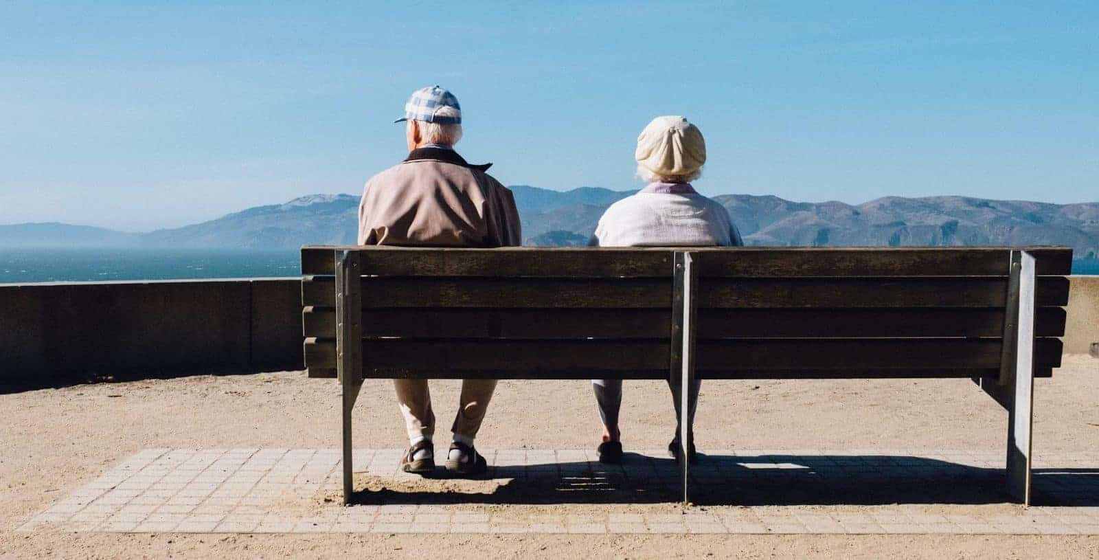 couple sitting on bench
