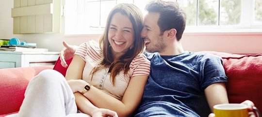 Happy couple enjoying customer support at Trust Point.