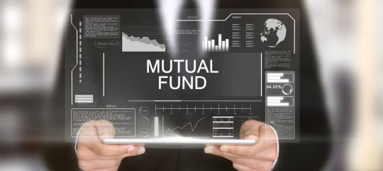 a man holding a sign that says mutual funds