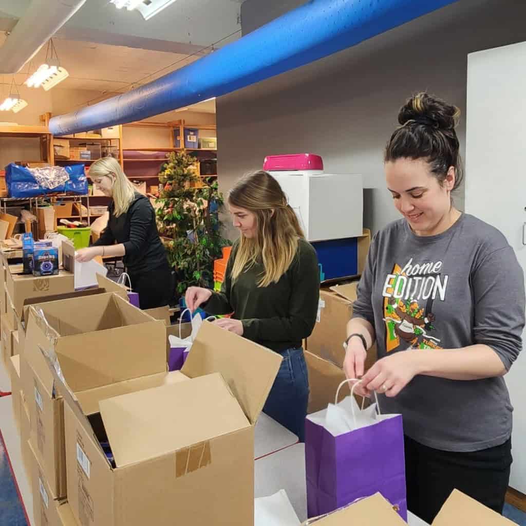 TPYP group packing gift bags at the Childrens Museum of La Crosse