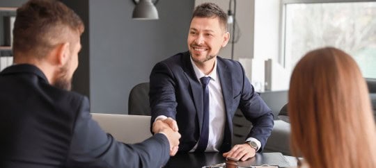 Business Professional shaking hands with a client