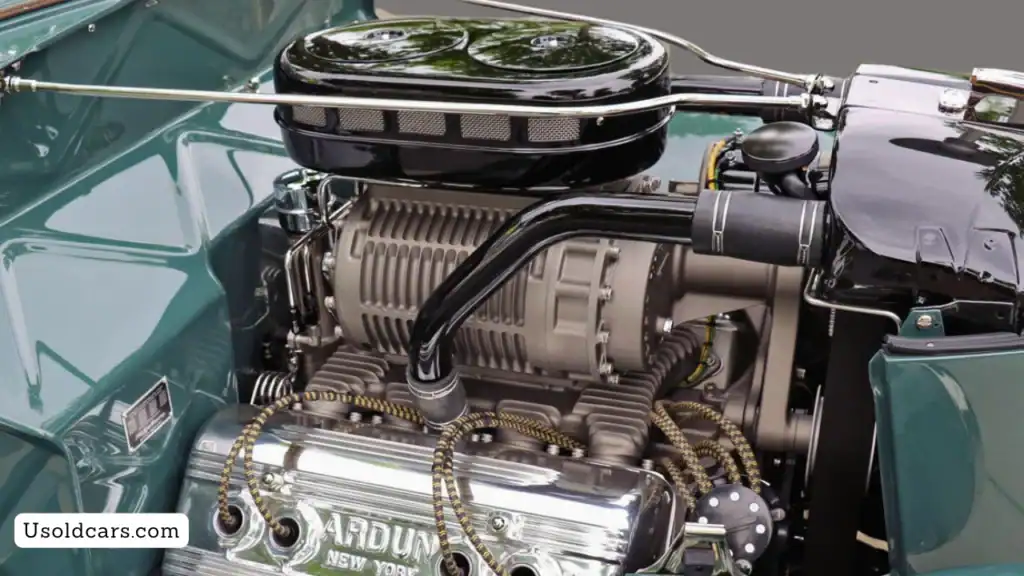 Signs of engine wear indicating the need for a rebuild in a classic car engine bay