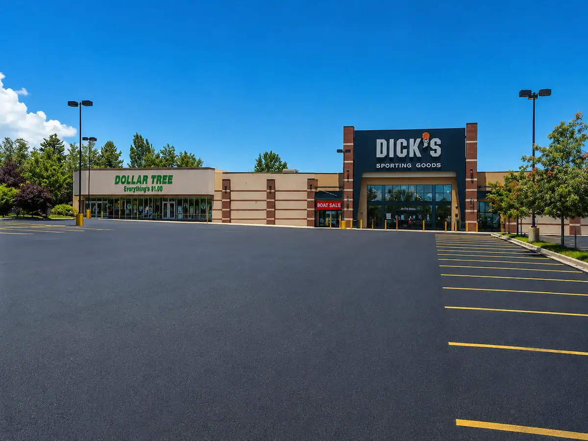 Fresh commercial parking lot resurfacing at retail shopping center in Utah