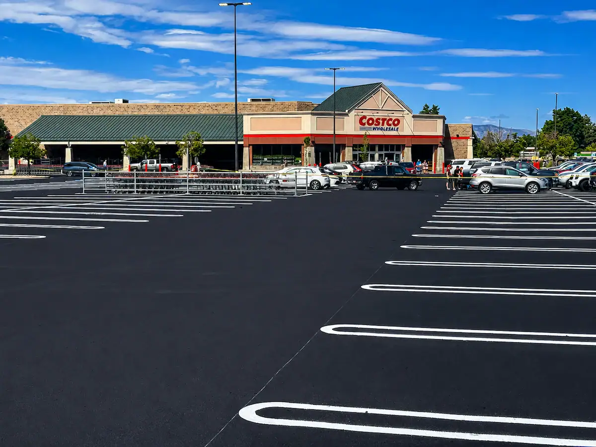 Freshly sealcoated Costco parking lot with new striping in Utah