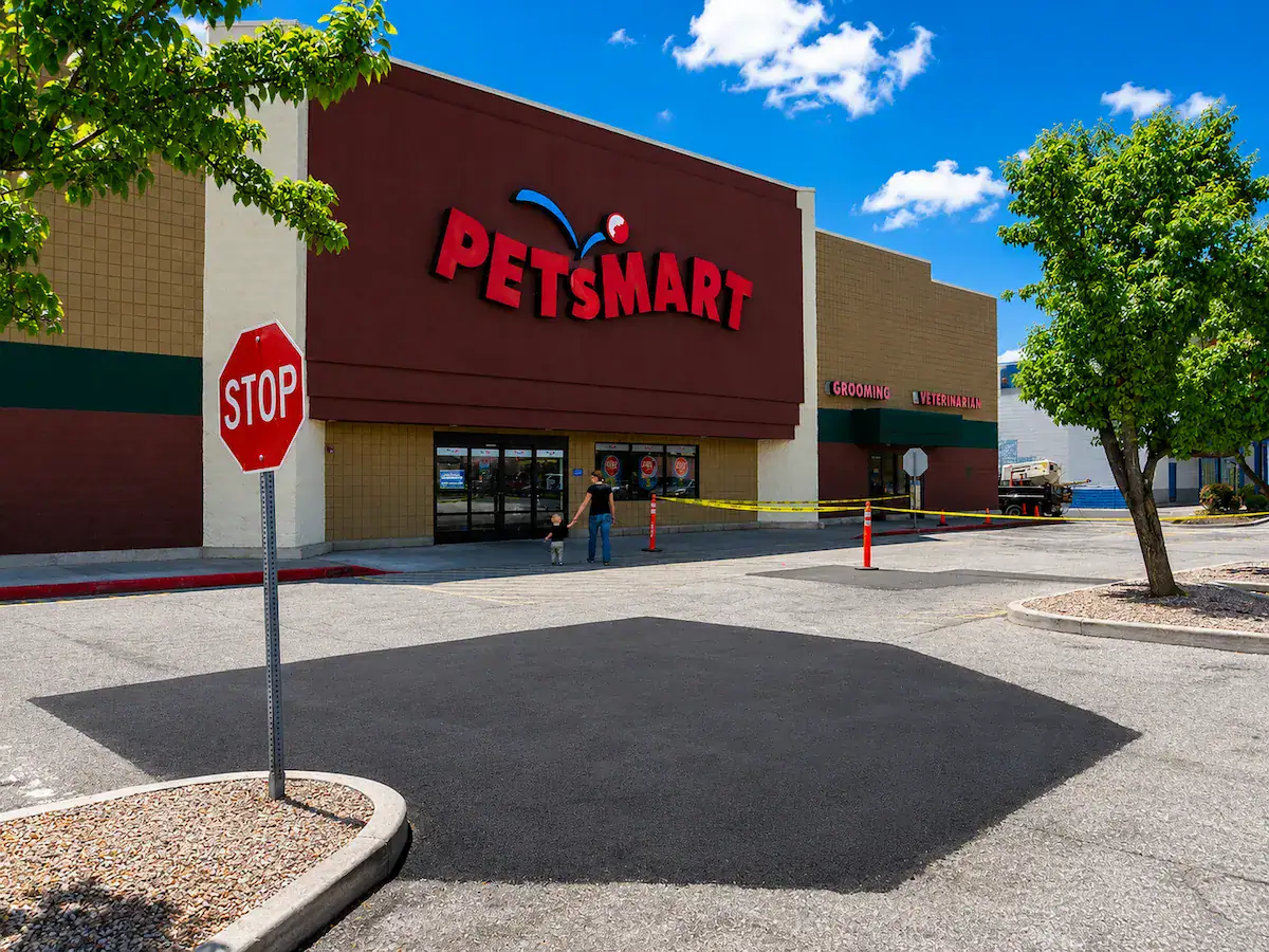 Commercial asphalt patching repair completed at a Utah retail property entrance