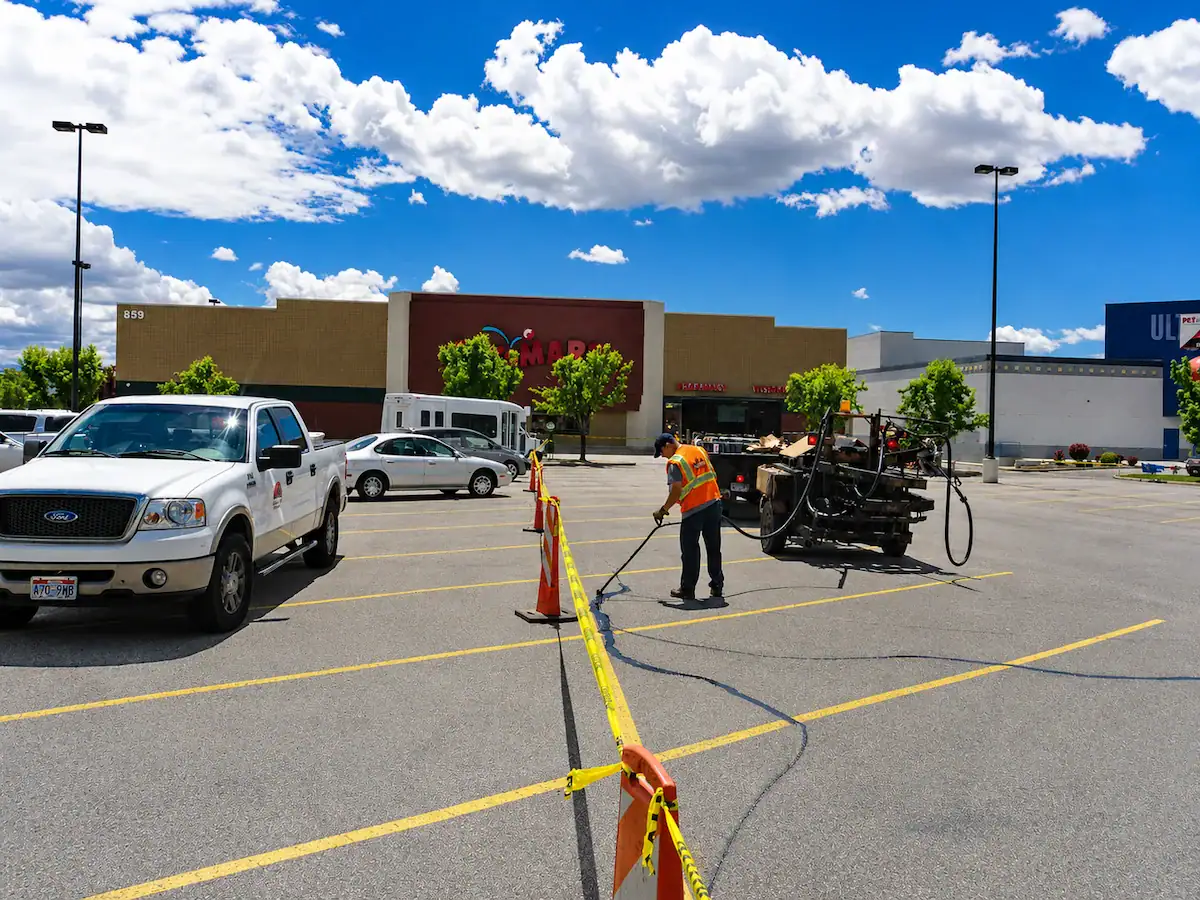 Commercial parking lot crack sealing project at a Utah shopping center