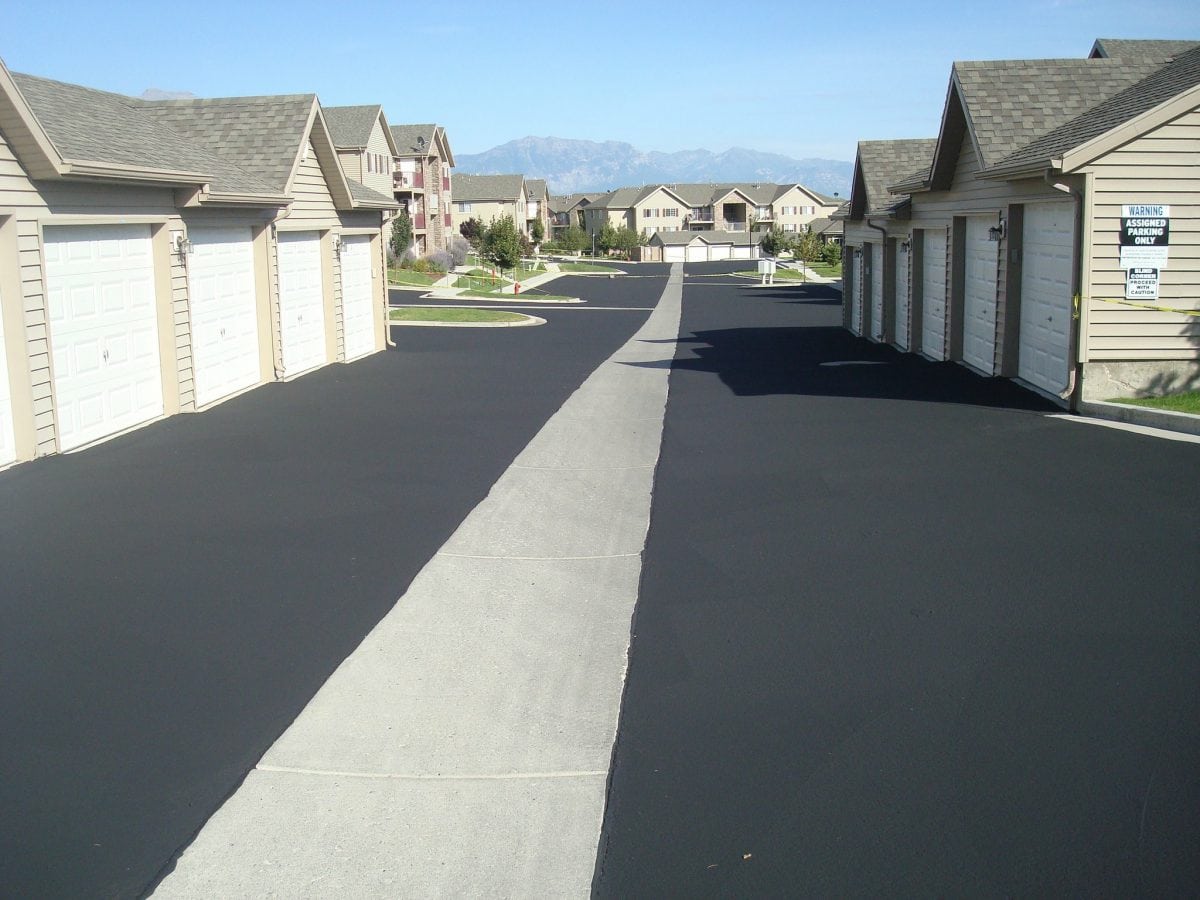 hoa asphalt sealcoat and waterway parking lot drain in utah