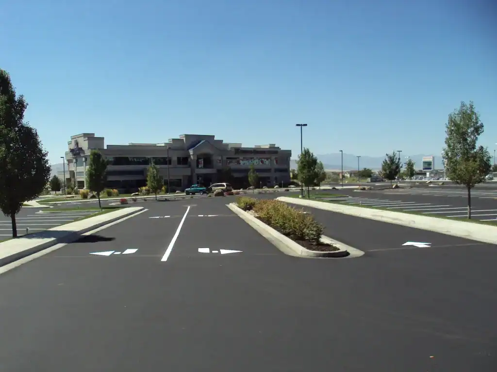Directional arrows and pavement markings in a Utah commercial parking lot