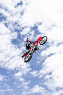 Freestyle motocross rider in the air
