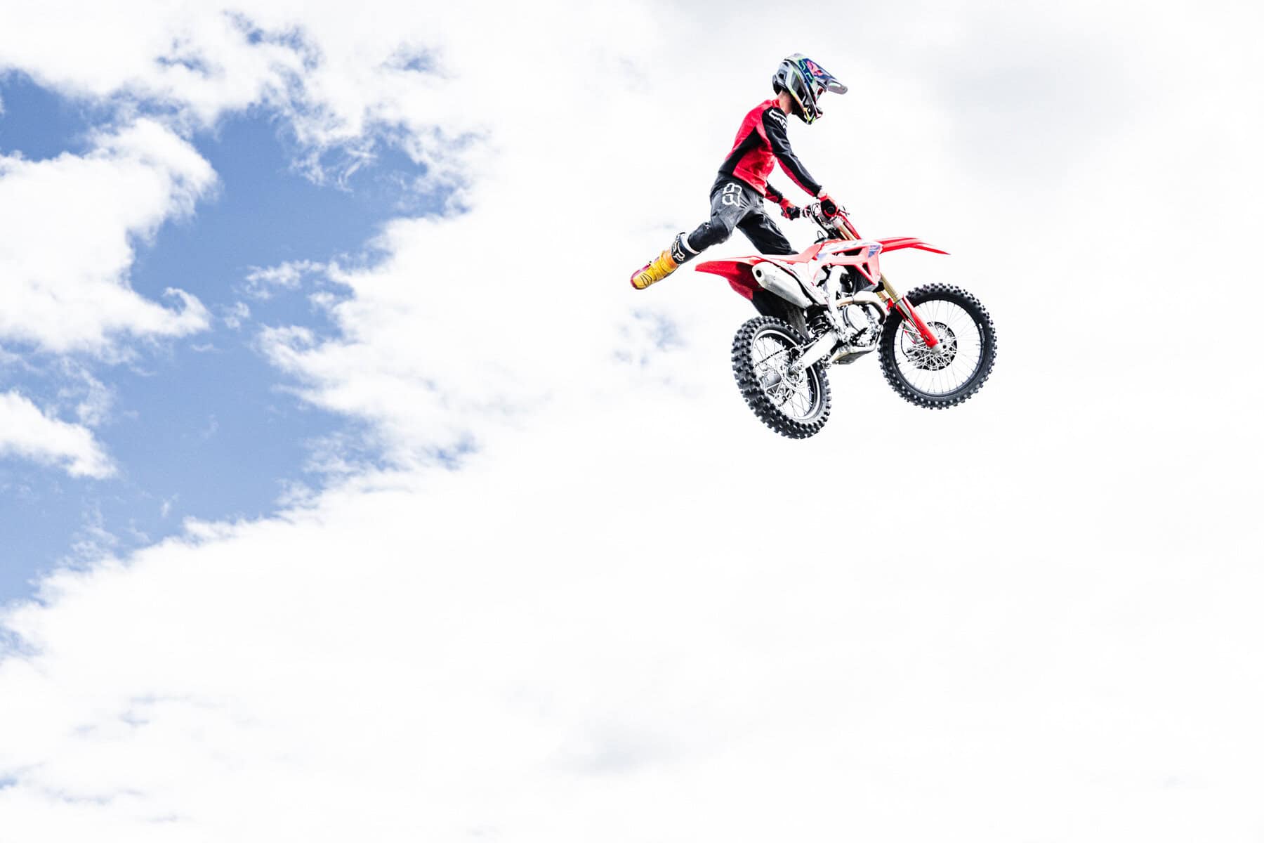 Freestyle motocross rider performing a trick