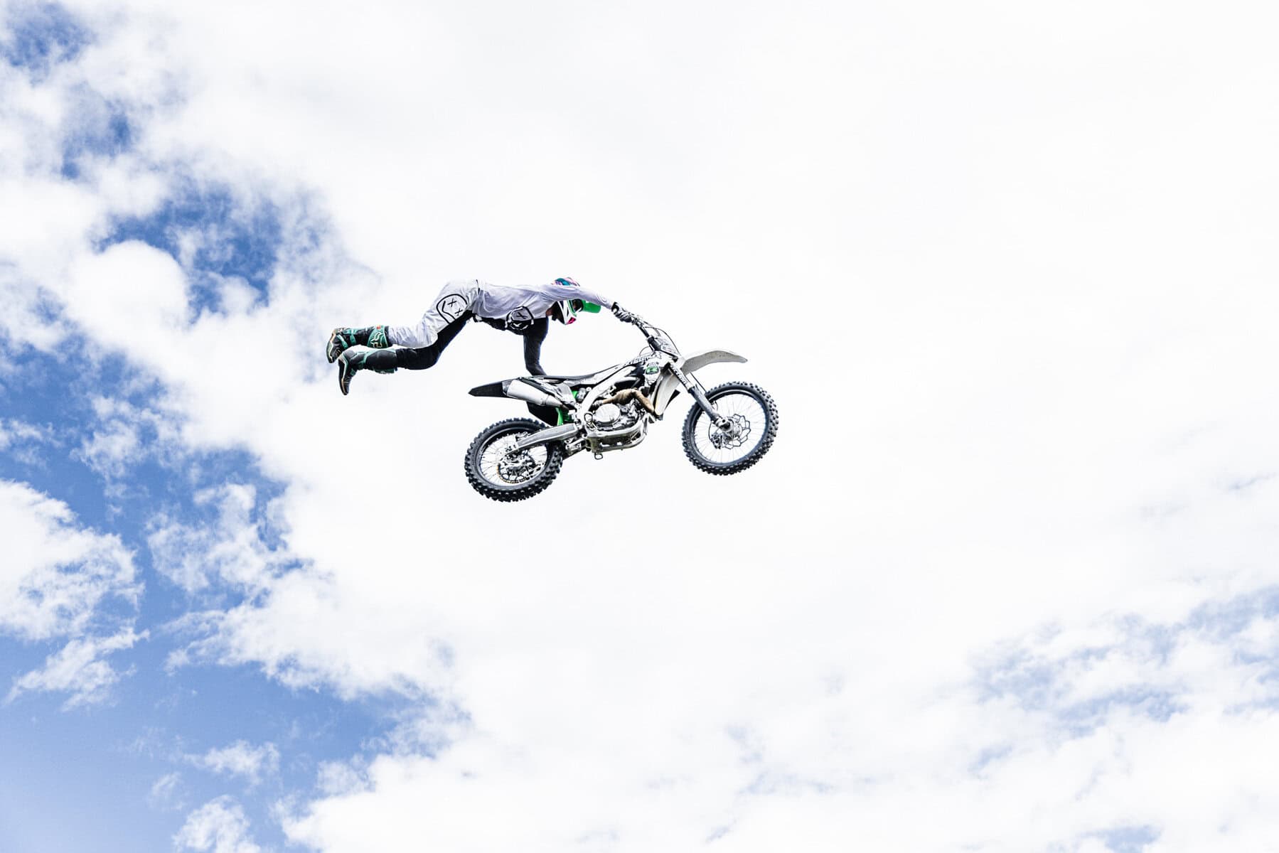Freestyle motocross rider flying through the air