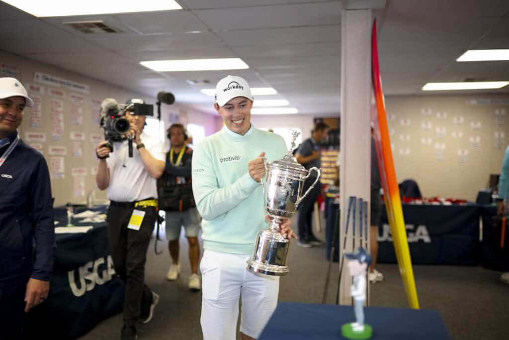 Matt Fitzpatrick returns the trophy to Player Services during a practice round of the 2023 U.S. Open at The Los Angeles Country Club in Los Angeles, Calif. on Monday, June 12, 2023. (James Gilbert/USGA)