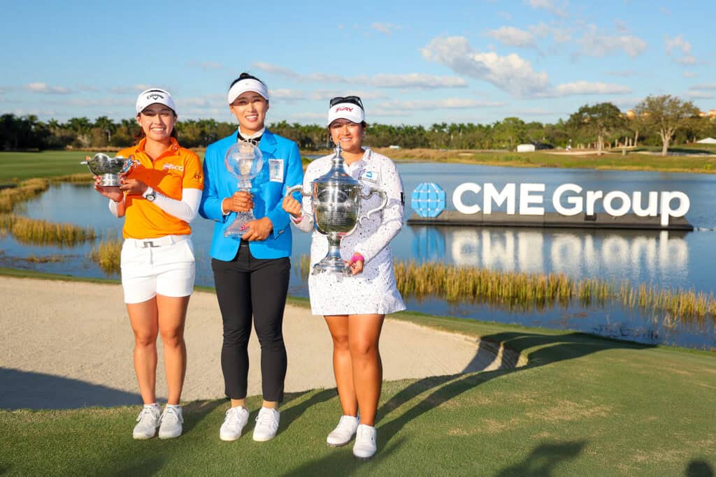 NAPLES, FLORIDA - NOVEMBER 19: (L-R) Atthaya Thitikul of Thailand poses with the Vare trophy, Amy Yang of Korea with the CME Globe trophy and Lilia Vu of the United States with the Rolex Player of the Year trophy after the CME Group Tour Championship at Tiburon Golf Club on November 19, 2023 in Naples, Florida. (Photo by Michael Reaves/Getty Images)