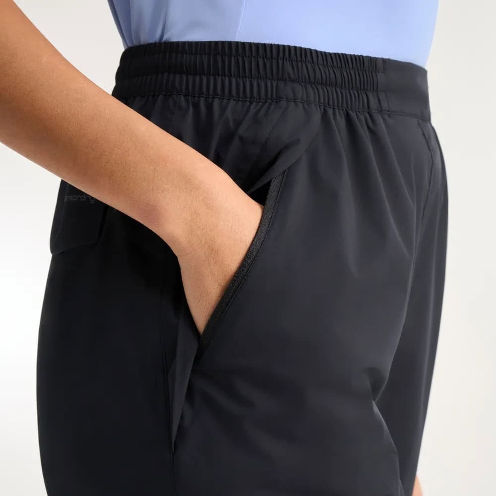 womens-aquadrive-waterproof-over-trouser-black-lifestyle-closeup-p93796