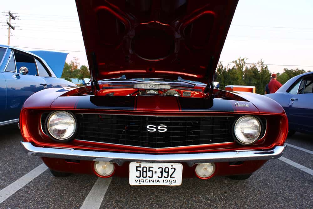 red Chevy Camaro SS with hood open