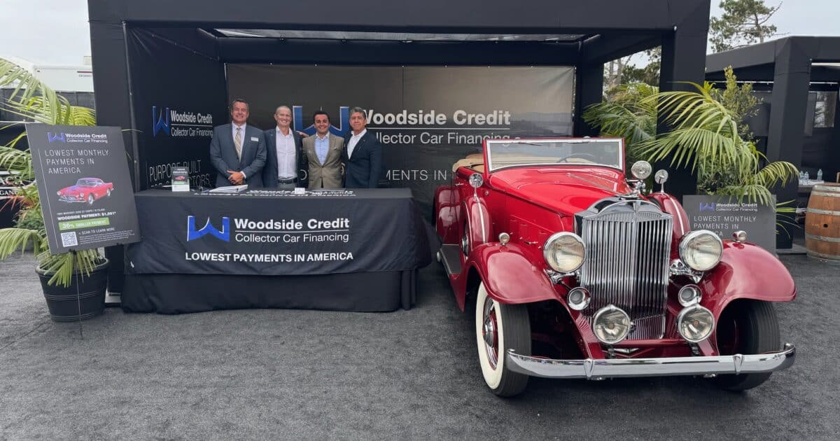 Woodside Credit display with 1933 Packard at Pebble Beach Concours d'Elegance 2024