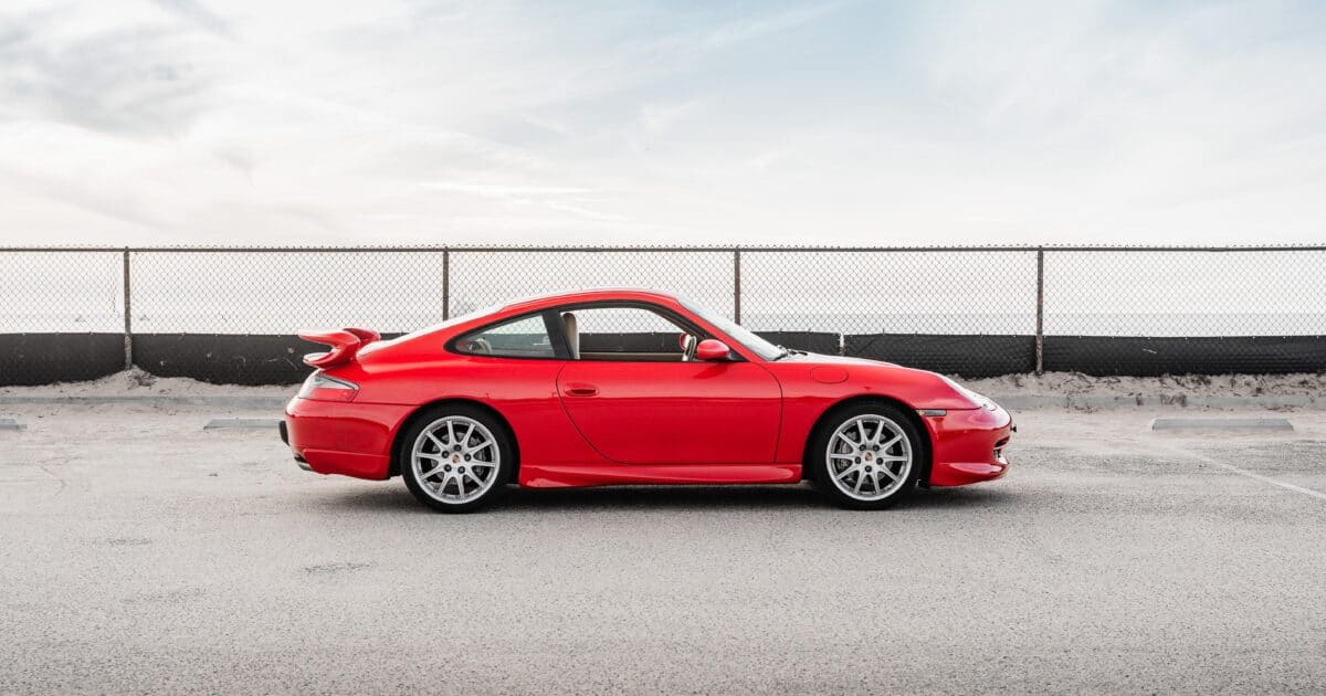 Red Porsche 911 GT3 with rear wing