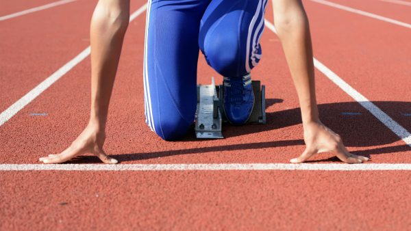 Runner on starting blocks