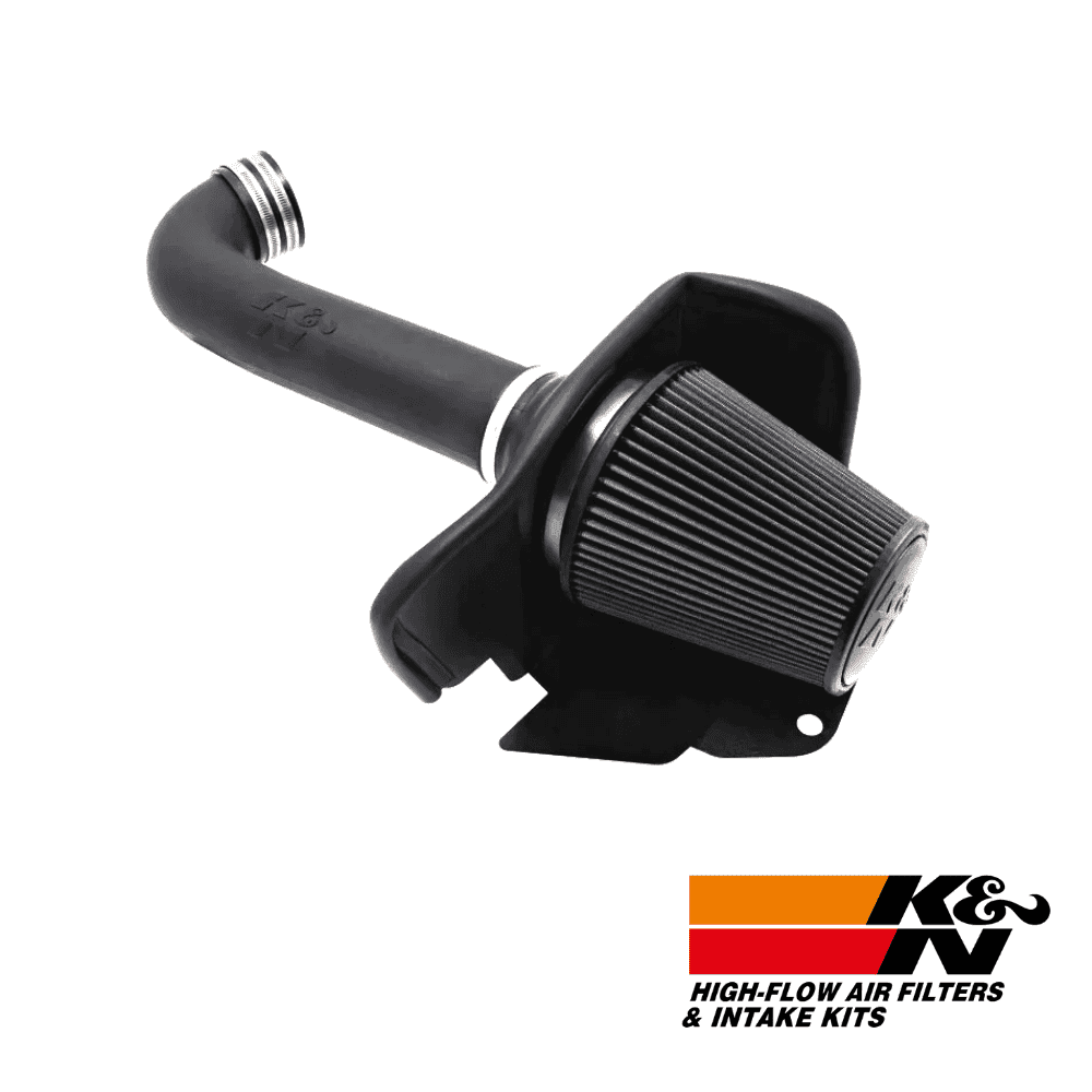 High-flow air filter and intake kit for vehicle engine performance enhancement.