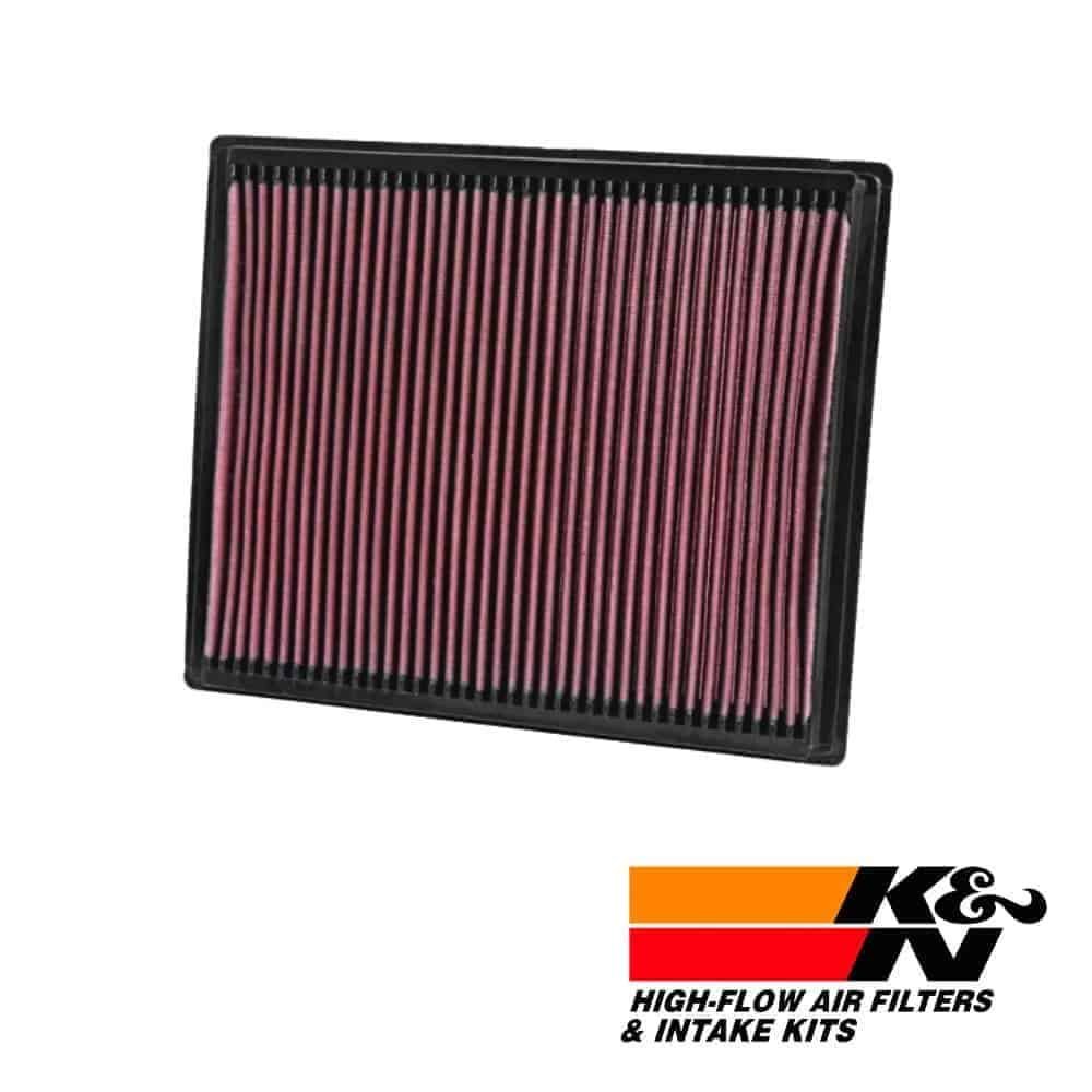High-flow air filter for vehicle engine, K&N intake kit replacement.