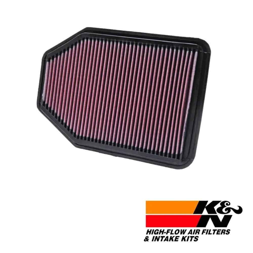 High-flow air filter for vehicle engine, K&N branded, durable and efficient filtration system.