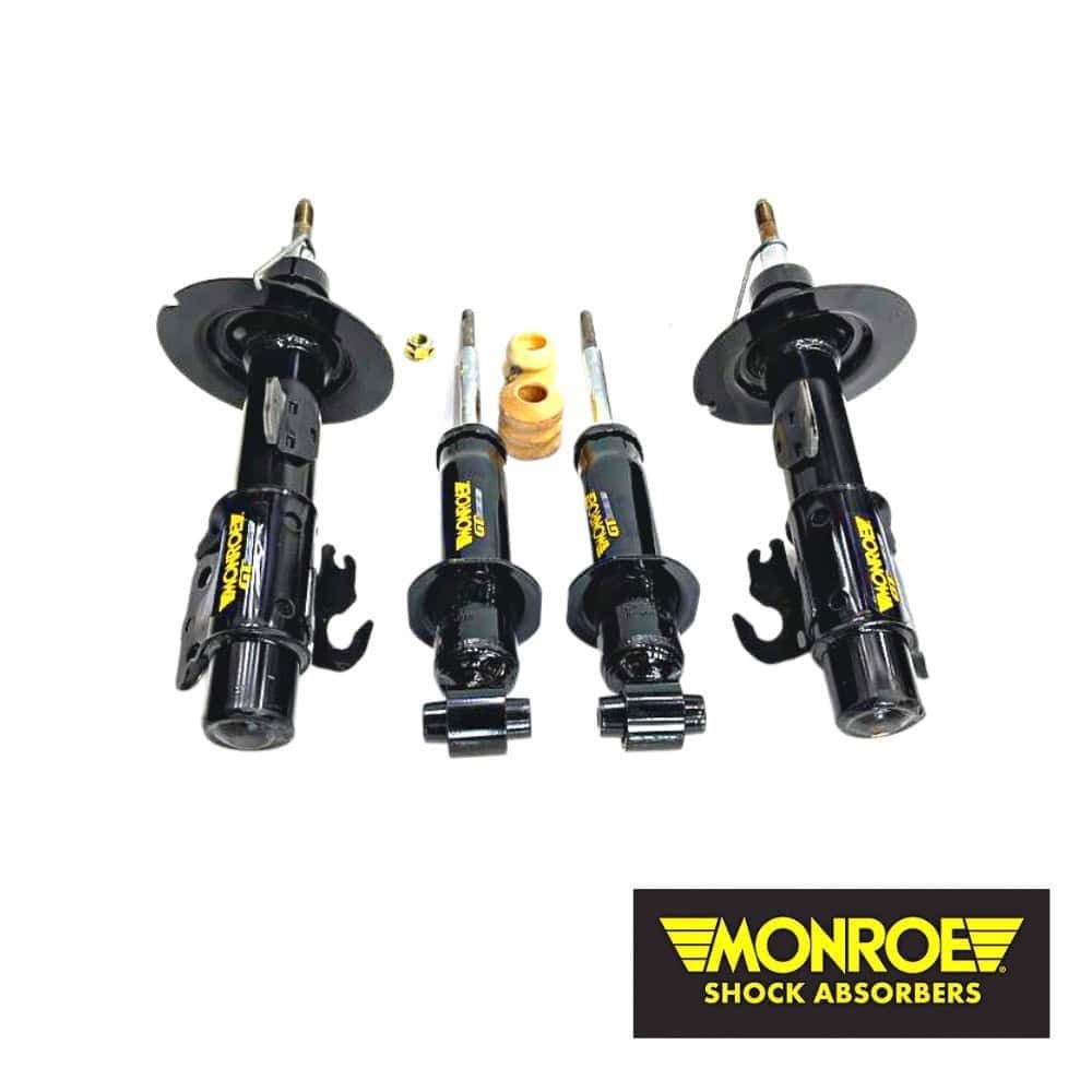 Monroe shock absorbers for vehicle suspension system, black with yellow branding.