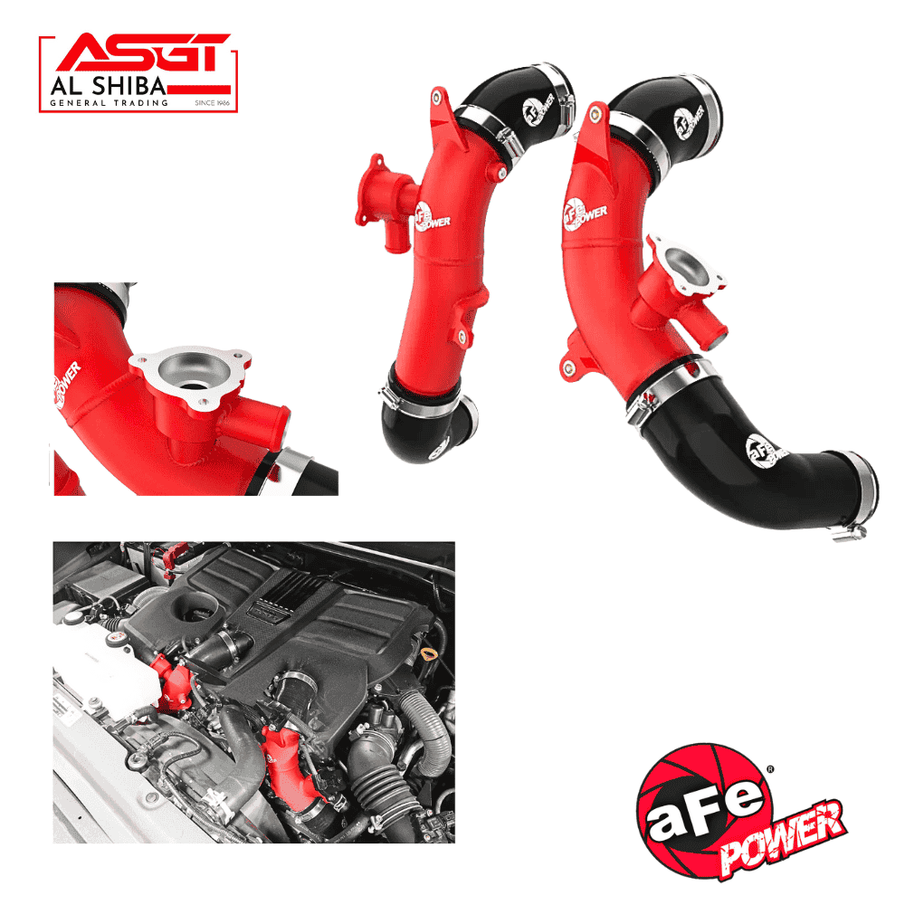 Red automotive intercooler pipes and engine bay components for car performance.